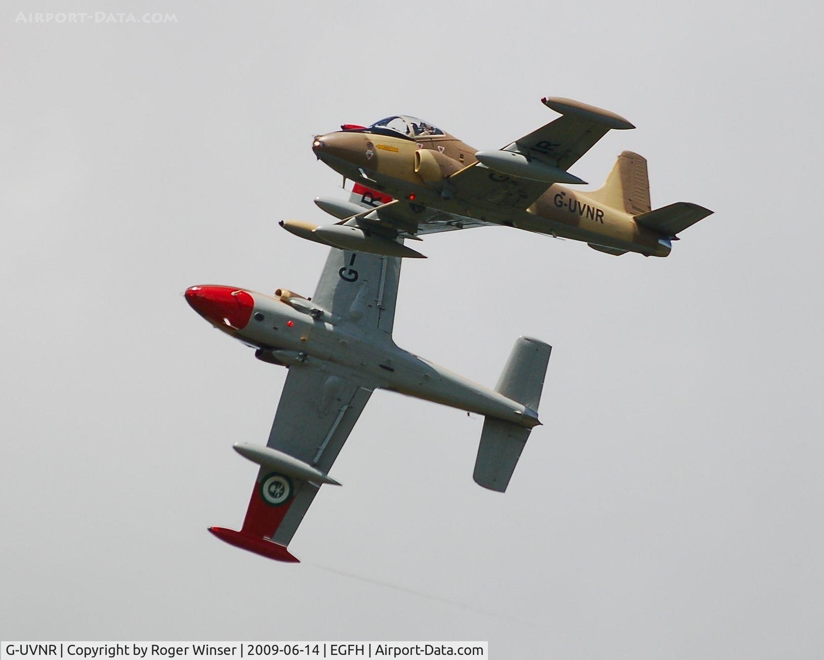 G-UVNR, 1971 BAC 167 Strikemaster Mk.87 C/N EEP/JP/2876, Run and break led by G-VPER before G-UVNR lands at base.