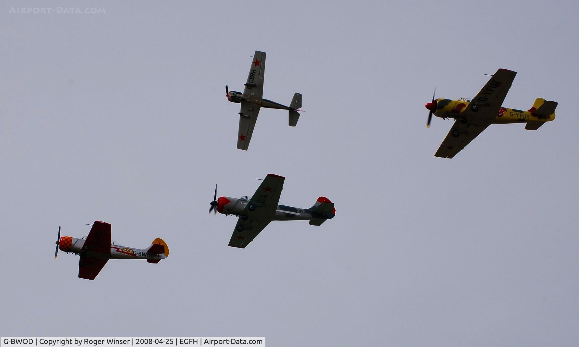 G-BWOD, 1983 Bacau Yak-52 C/N 833810, Resident Yak-52's during formation practice over Swansea Airport. G-BWOD re-registered G-STNR on 1st December 2010.