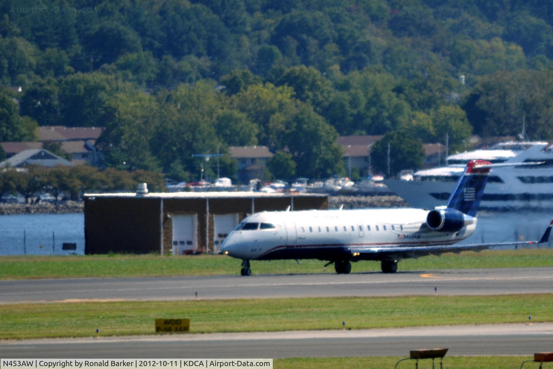 N453AW, 2003 Bombardier CRJ-200LR (CL-600-2B19) C/N 7838, Takeoff DCA