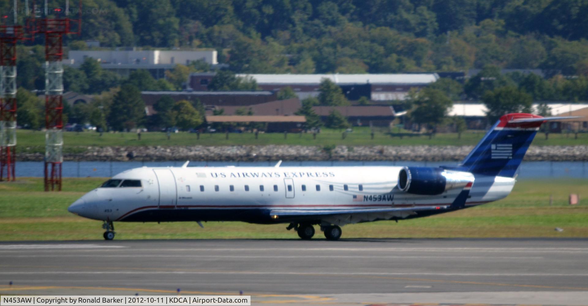 N453AW, 2003 Bombardier CRJ-200LR (CL-600-2B19) C/N 7838, Takeoff DCA