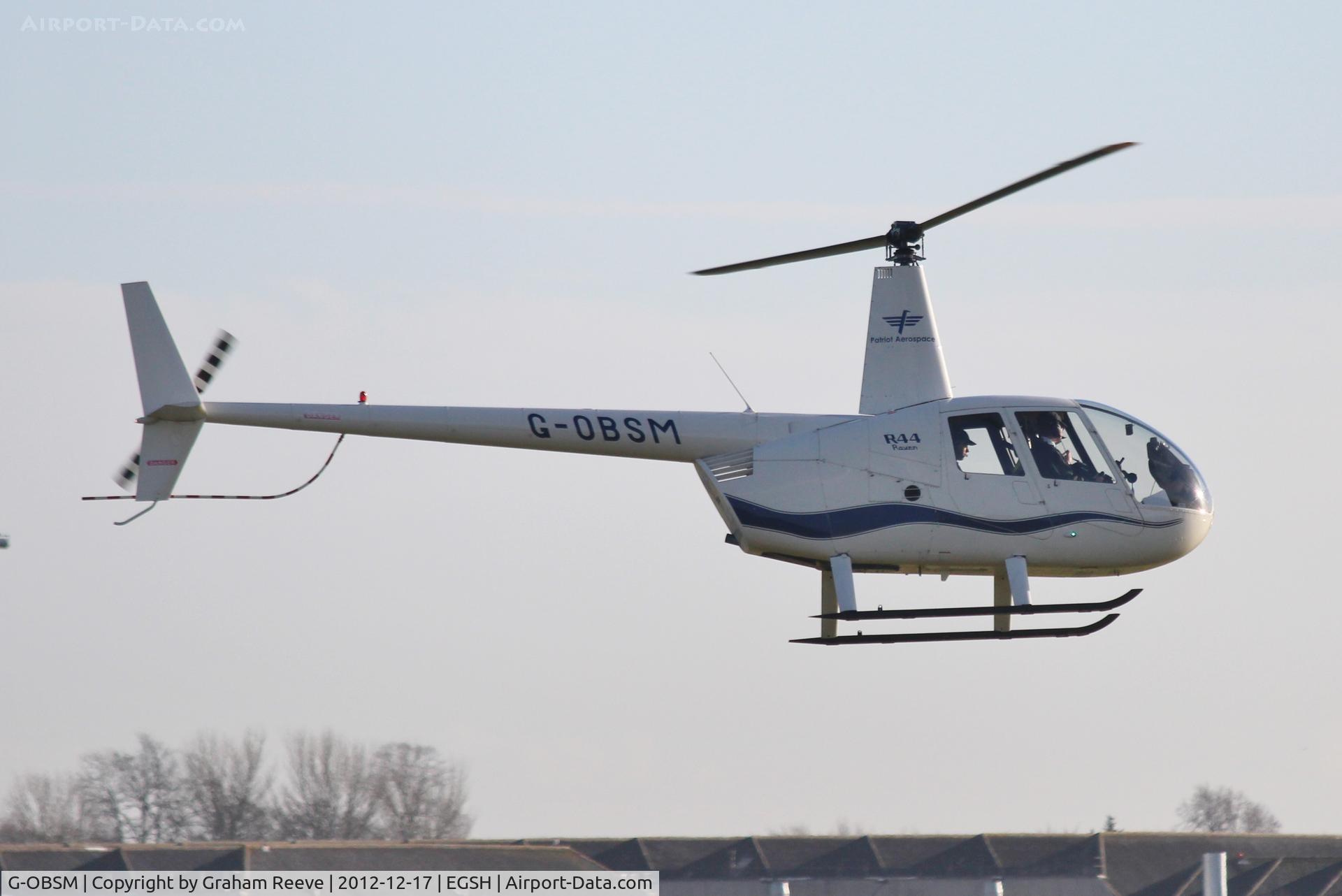 G-OBSM, 2001 Robinson R44 Raven C/N 1030, About to land at Norwich.