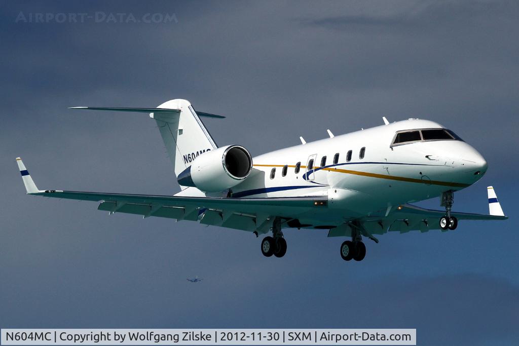 N604MC, 2004 Bombardier Challenger 601-3A (CL-600-2B16) C/N 5581, in background KLM 744