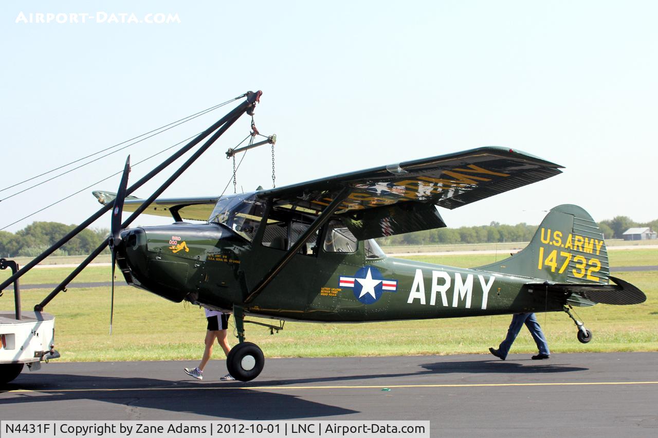 N4431F, Cessna L-19E Bird Dog C/N 24562, At the 2012 Warbirds on Parade - Lancaster, TX 
Being carried to the ramp after a ground loop incident.