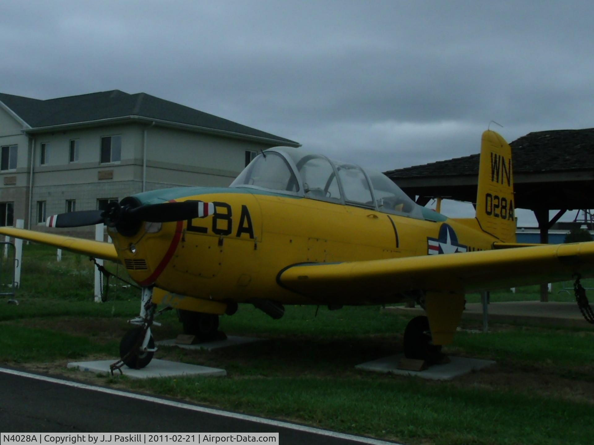 N4028A, 1961 Beech D-45 Mentor C/N BG-297, Propeller got damaged during a landing from a flight.