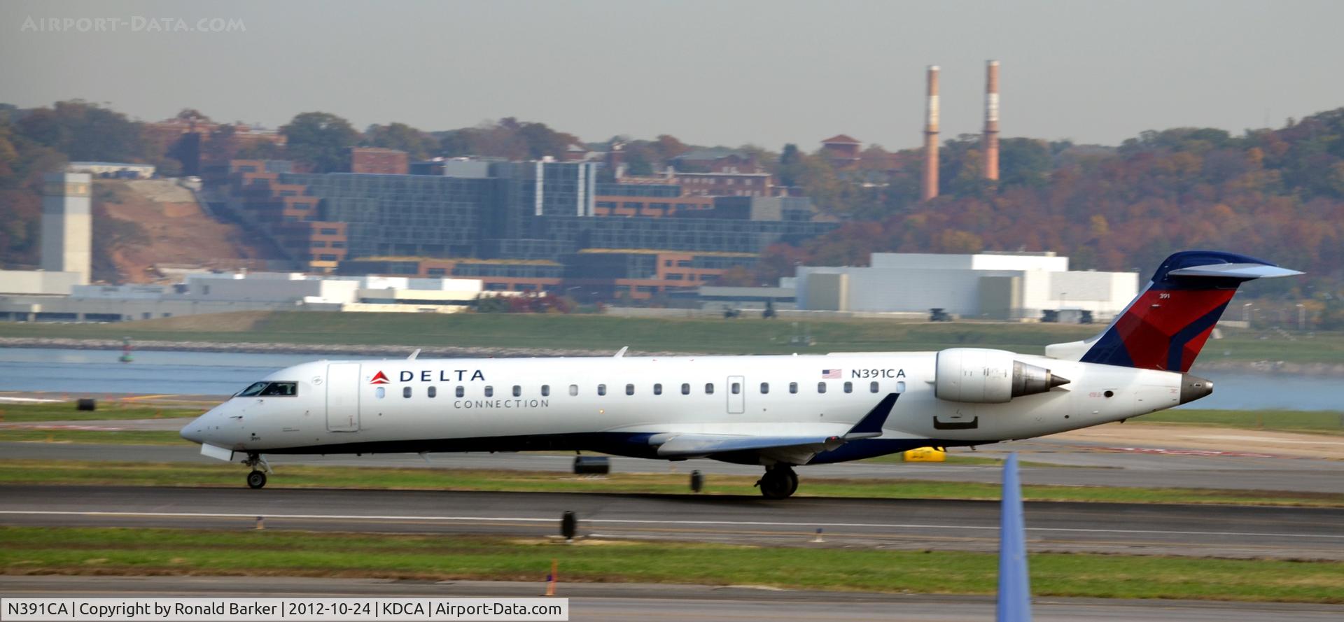 N391CA, 2003 Bombardier CRJ-701ER (CL-600-2C10) Regional Jet C/N 10108, Takeoff DCA