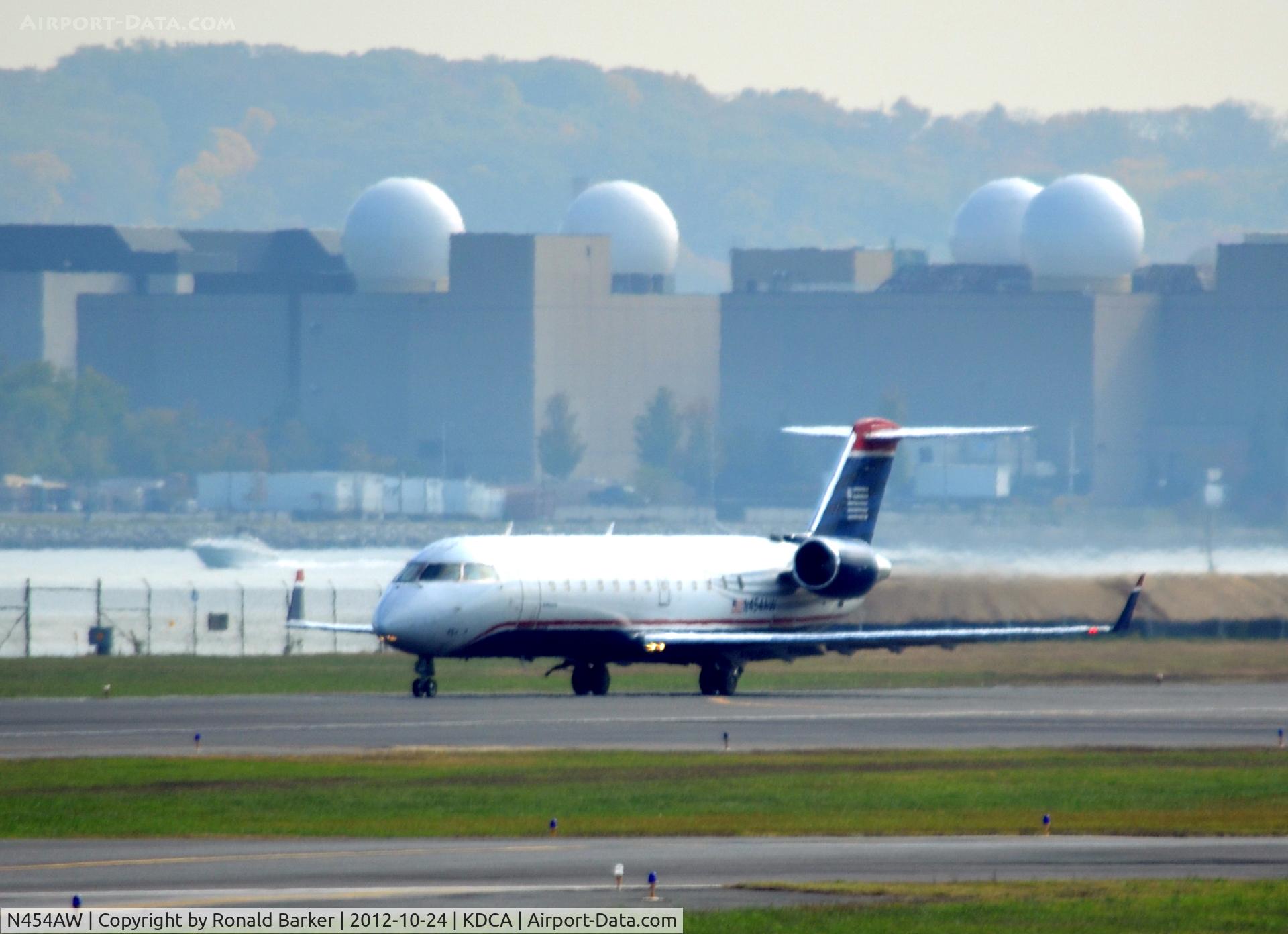 N454AW, 2003 Bombardier CRJ-200LR (CL-600-2B19) C/N 7842, Takeoff DCA
