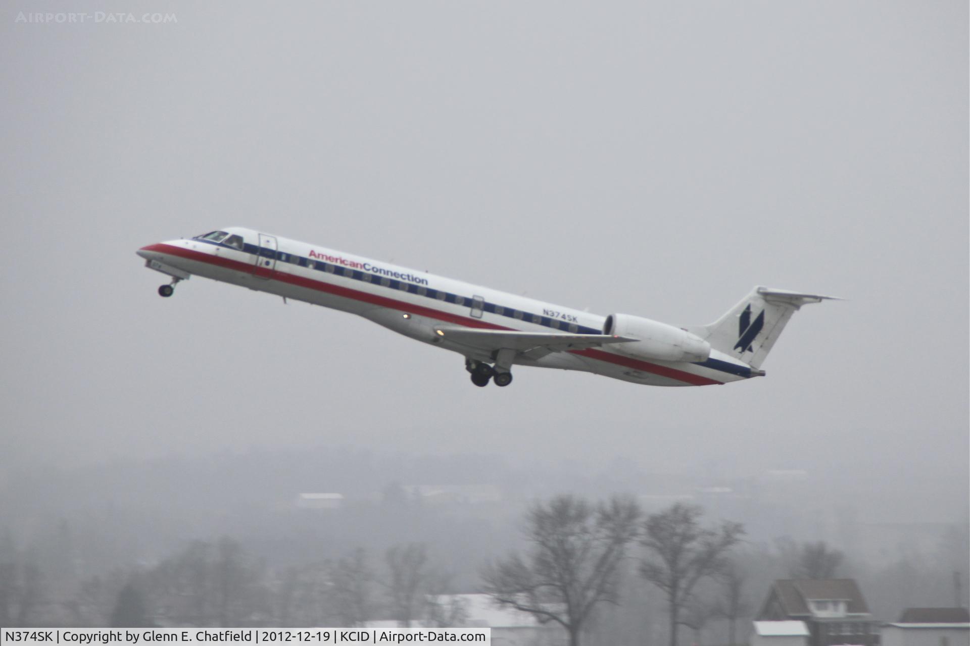 N374SK, 2001 Embraer ERJ-140LR (EMB-135KL) C/N 145544, Departing runway 9, shot from the control tower