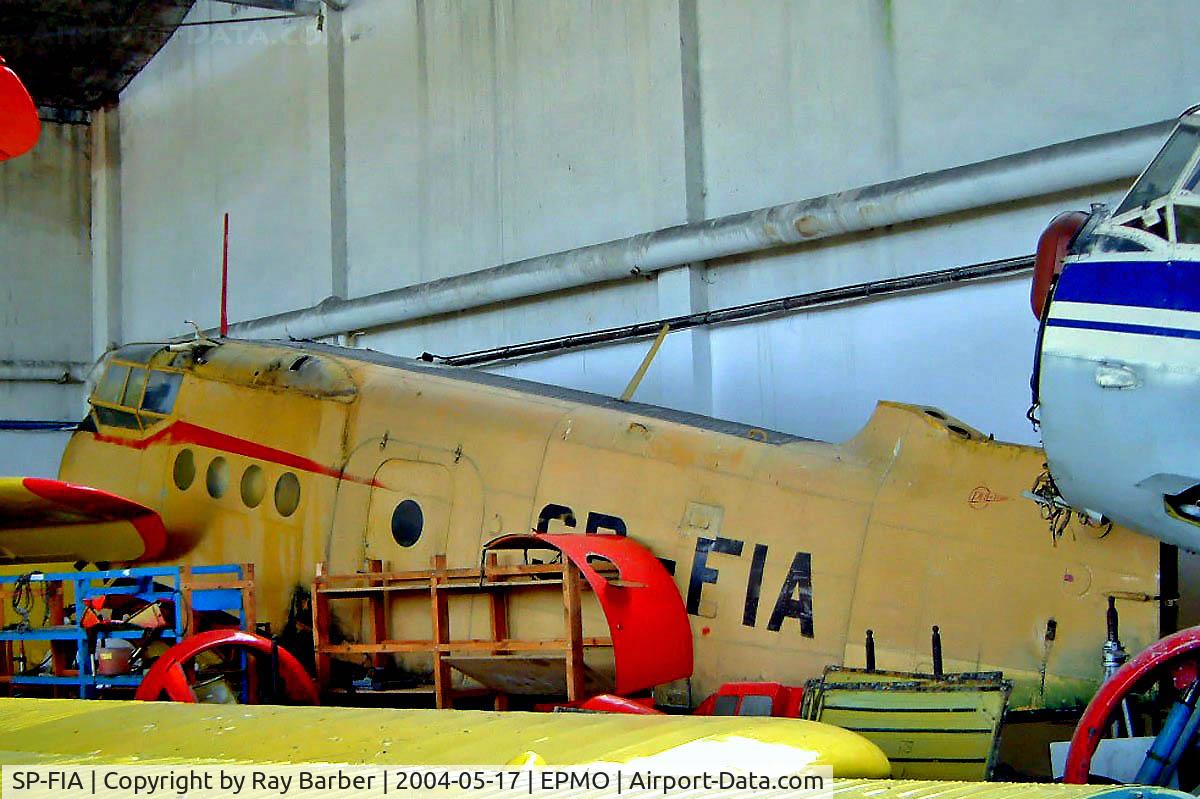 SP-FIA, 1975 Antonov An-2R C/N 1G161-02, Antonov An-2R [1G161-02] Modlin~SP 17/05/2004. Seen here dismantled and stored. Has now been rebuilt and become SP-ALZ.