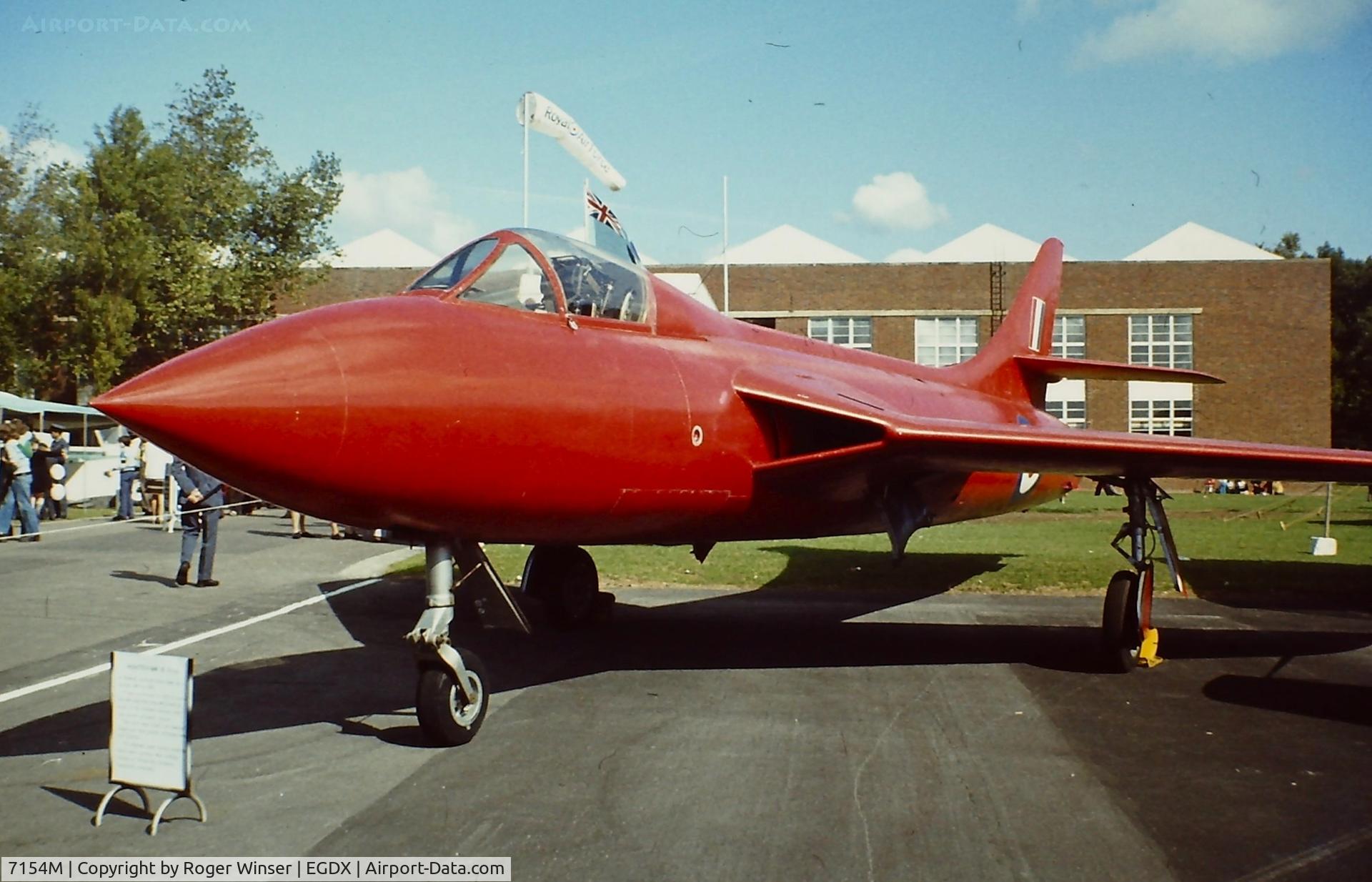 7154M, 1951 Hawker Hunter F.3 C/N 41H/665401, The first Hawker P1067 Hunter prototype WB188 converted to Mk.3 standards and gained the world air speed record in 1953. Seen as Instructional Airframe 7154M at a RAF St. Athan Battle of Britain air show in the 1980's.