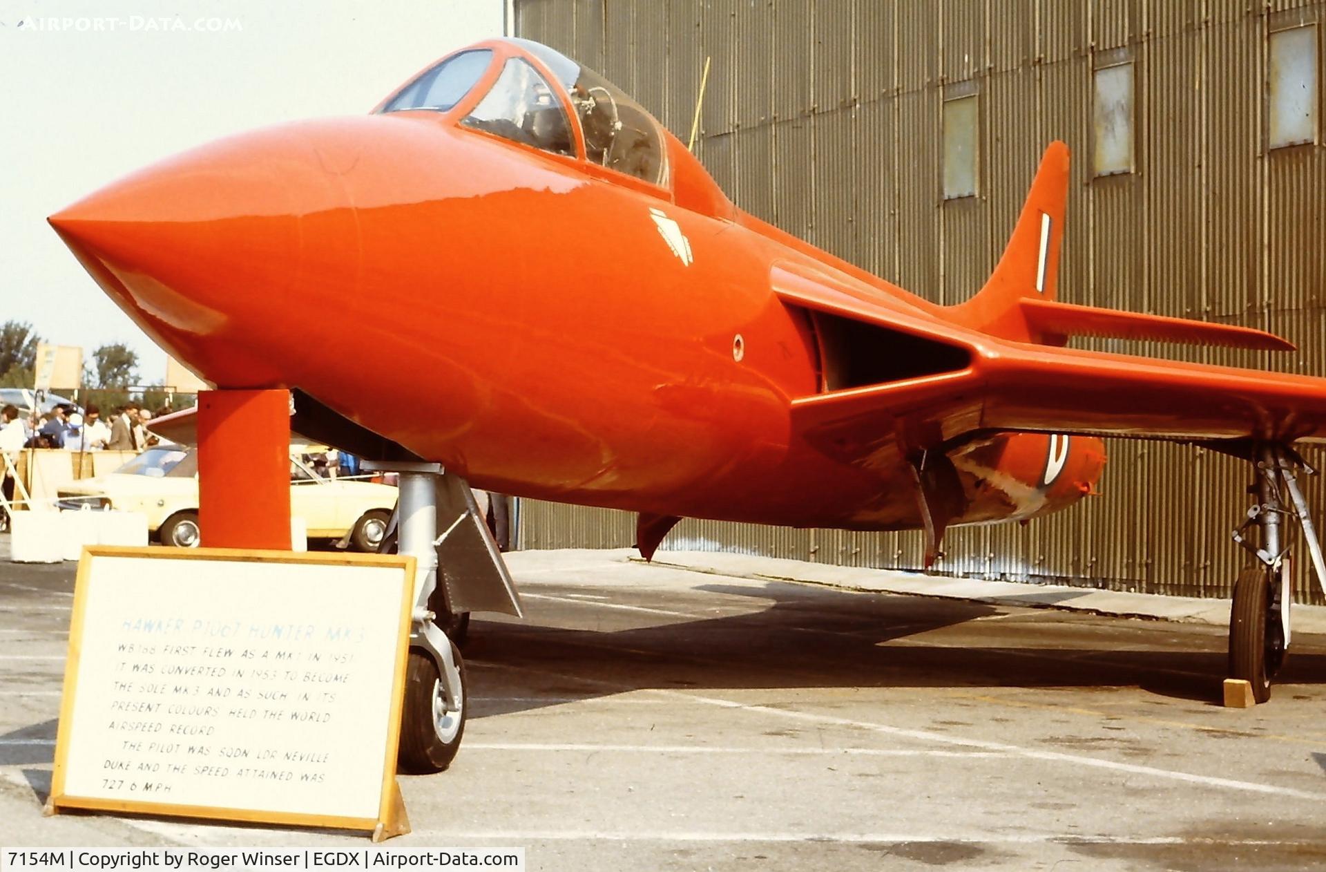 7154M, 1951 Hawker Hunter F.3 C/N 41H/665401, The first Hawker P1067 Hunter prototype WB188 converted to Mk.3 standards and gained the world air speed record in 1953. Seen as Instructional Airframe 7154M at a RAF St. Athan Battle of Britain airshow in the early 1980's.