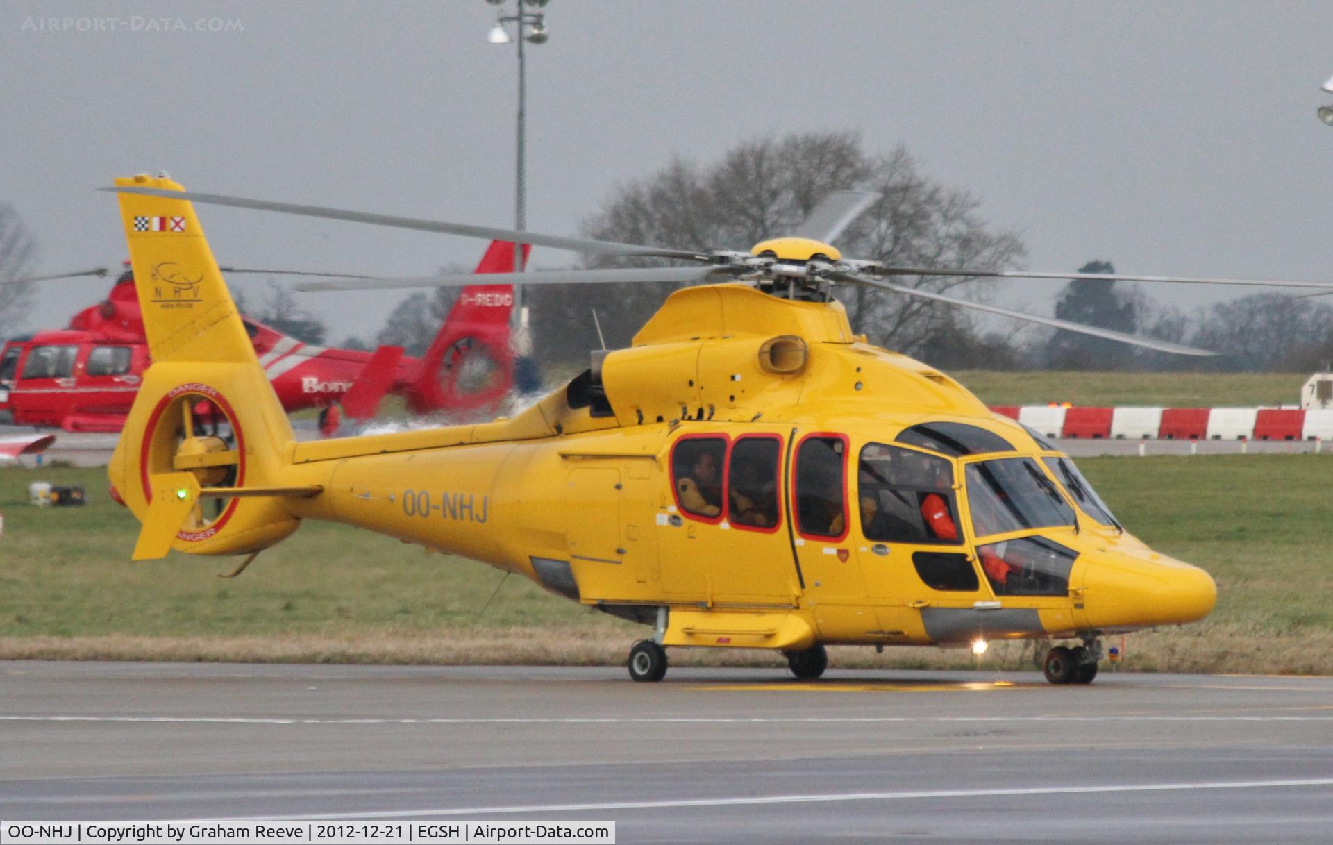OO-NHJ, 2009 Eurocopter EC-155B-1 C/N 6842, Taxing out to depart.