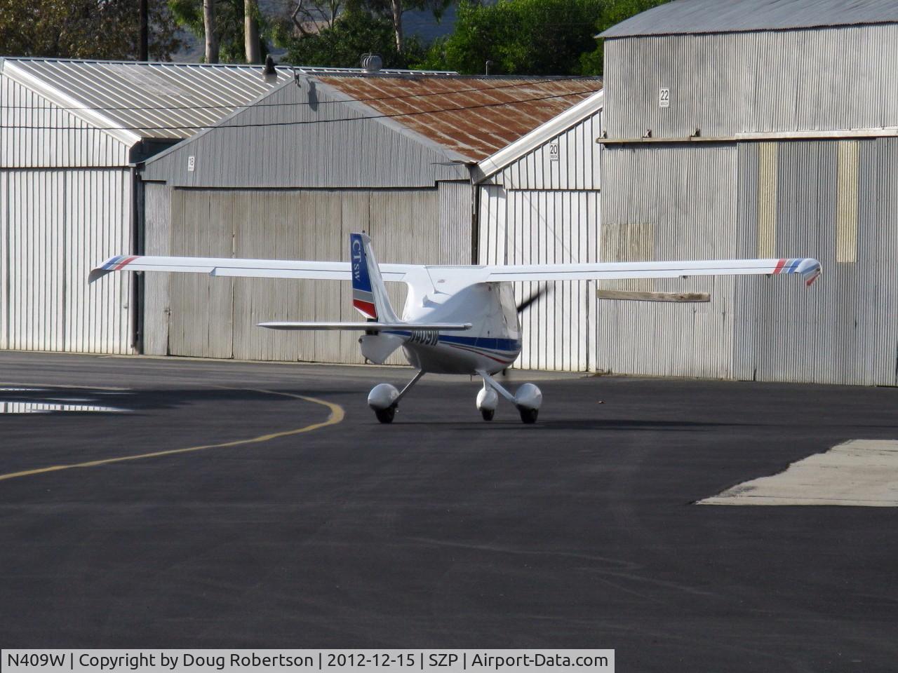N409W, 2006 Flight Design CTSW C/N 06-07-06, 2006 Flight Design Gmbh CTSW, Rotax 912ULS 100 Hp, taxi to hangar