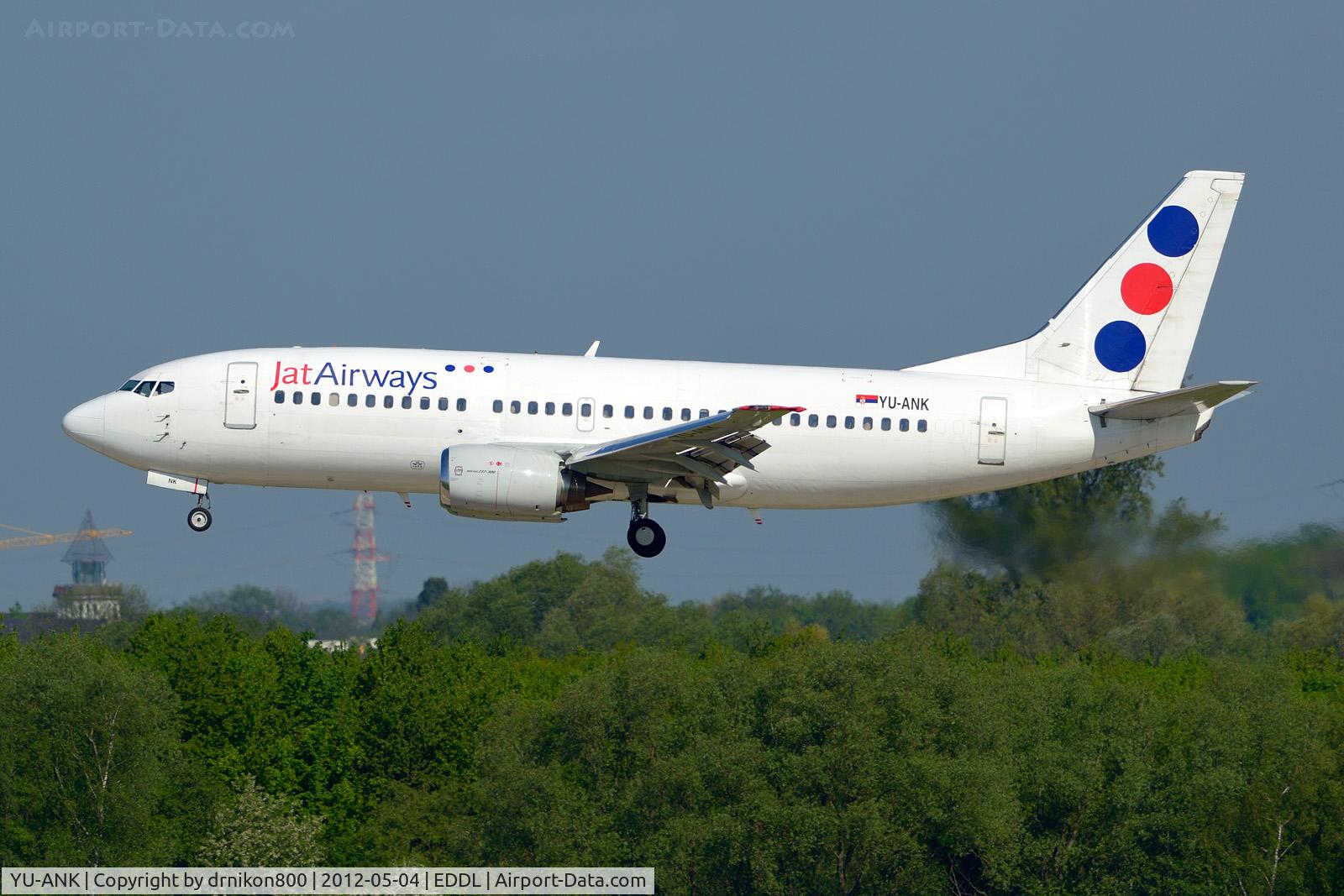 YU-ANK, 1986 Boeing 737-3H9 C/N 23715, landing DUS, view from visitor terrace airport station