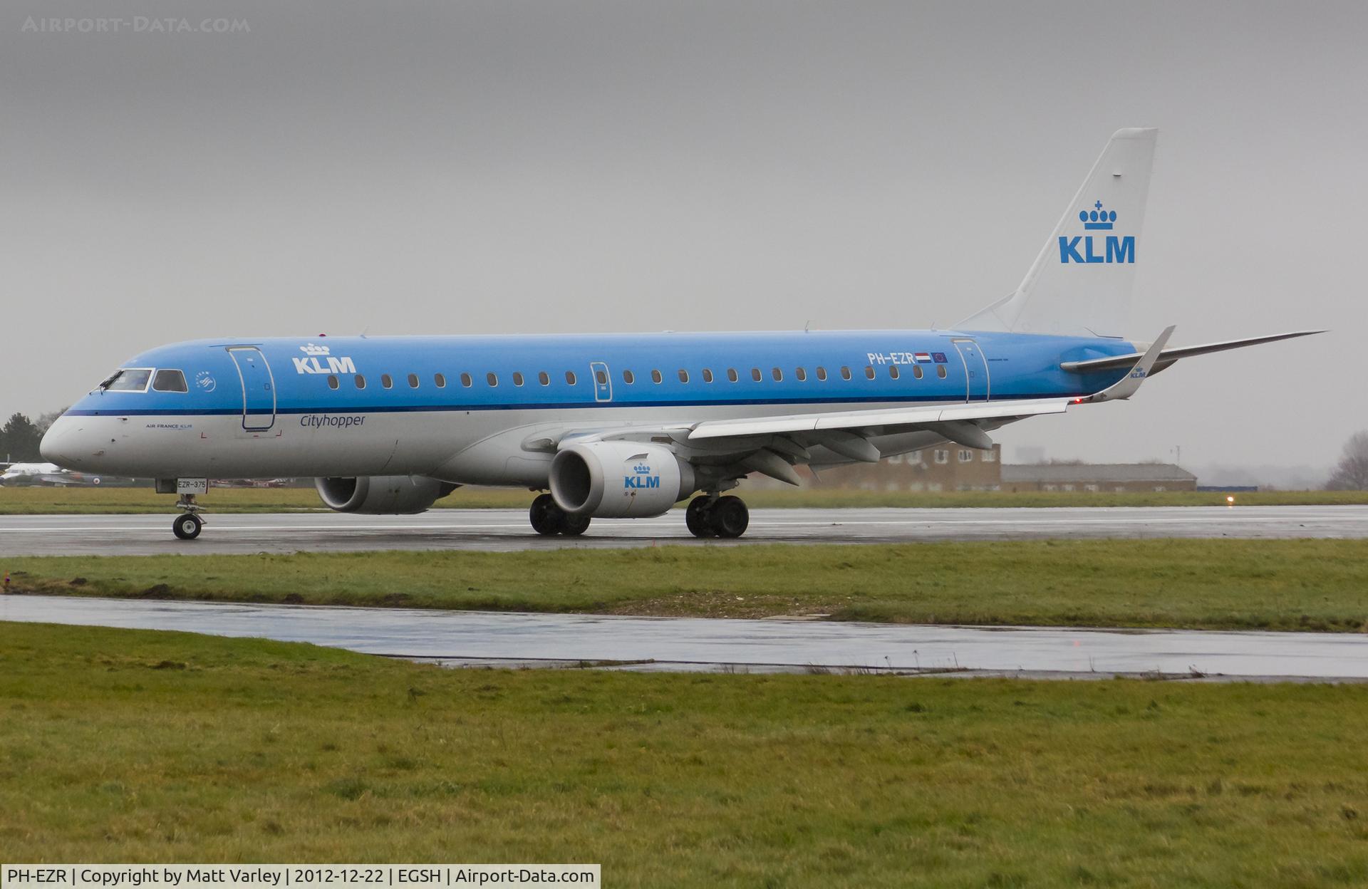 PH-EZR, 2010 Embraer 190LR (ERJ-190-100LR) C/N 19000375, Departing EGSH in very wet and dull conditions.