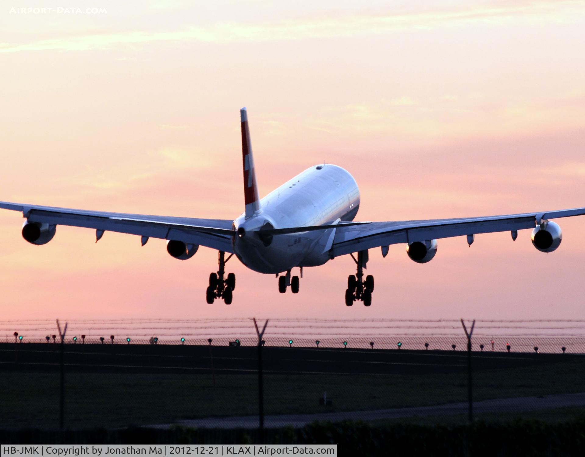 HB-JMK, 1997 Airbus A340-313 C/N 169, Dusk landing