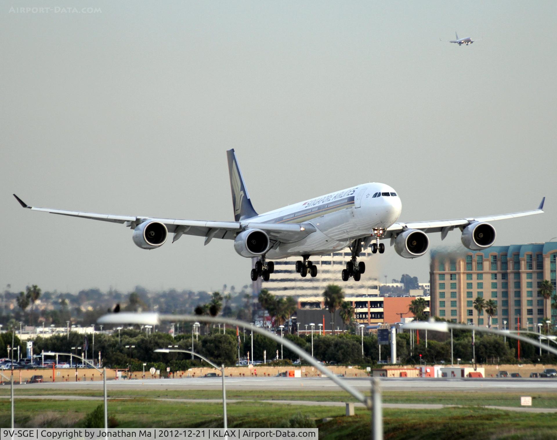 9V-SGE, 2004 Airbus A340-541 C/N 563, Landing 24R. Taken from Westchester Bridge