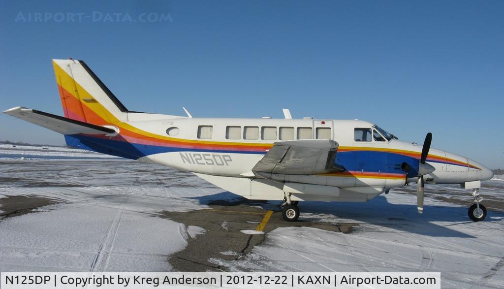 N125DP, 1968 Beech 99 C/N U-12, A Beech 99 of Bemidji Aviation Services resting between cargo runs during the holiday season.