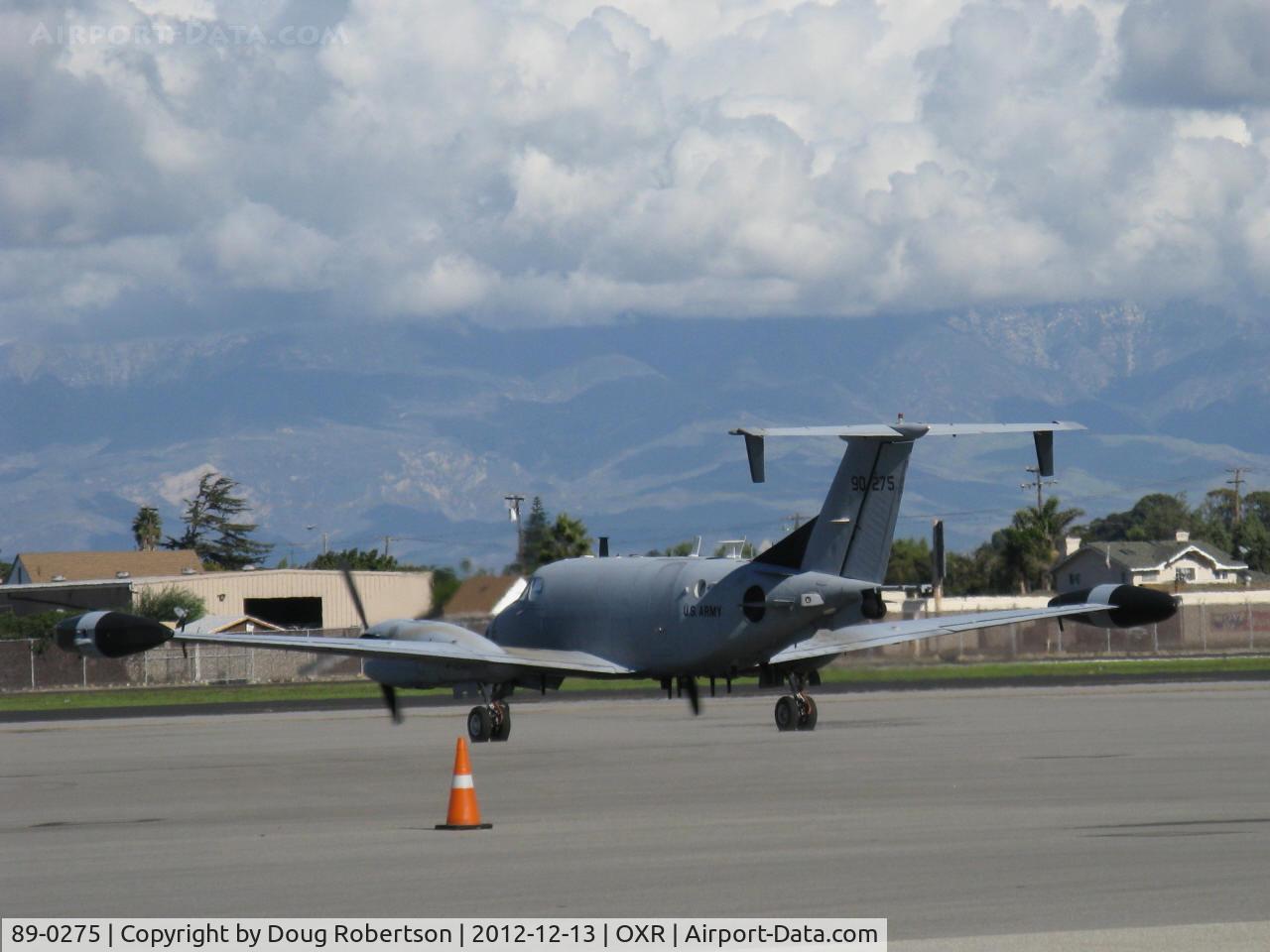 89-0275, 1990 Beech RC-12N C/N 89-0275, 1990 Beech Aircraft Corp. RC-12N GUARDRAIL of US Army, two P&W(C)PT6A-41 Turboprops, 850 shp each, taxi to Rwy 25