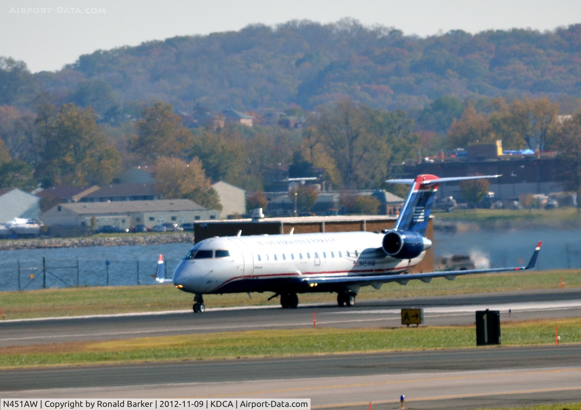 N451AW, 2003 Bombardier CRJ-200LR (CL-600-2B19) C/N 7832, Takeoff DCA