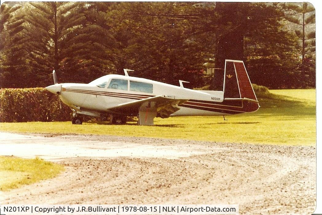 N201XP, Mooney M20J 201 C/N 24-1675, Stopped over for refueling on Norfolk Island (South Pacific Ocean) while acting as support-radio plane for a number of Cessna aircraft being ferried to Australia. Pilot told us he had to use flaps when close flying with the cessnas to be slow enough.