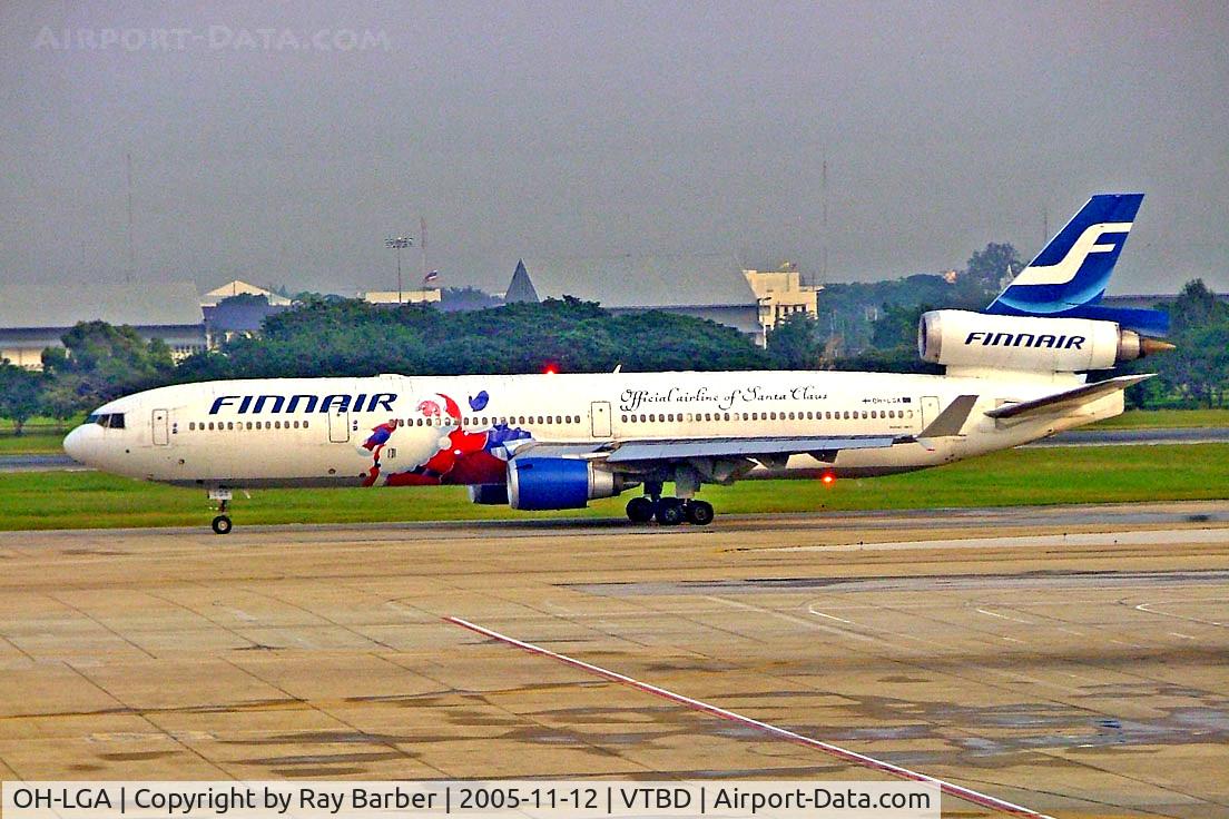 OH-LGA, McDonnell Douglas MD-11 C/N 48449, McDonnell-Douglas MD-11 [48449] (Finnair) Bangkok~HS 12/11/2005. Taken through the glass of the terminal.