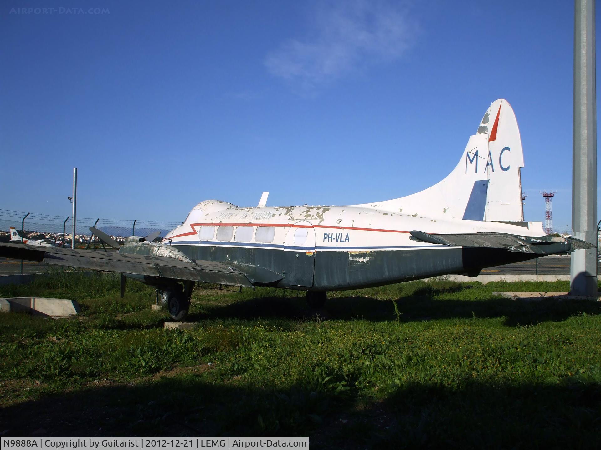 N9888A, 1963 De Havilland DH-104 Dove 7A C/N 04534, Showing PH-VLA which is a False registration. Being displayed at the Malaga airport aviation museum