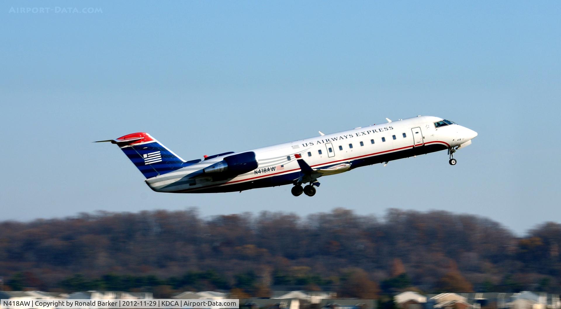 N418AW, 2002 Bombardier CRJ-200LR (CL-600-2B19) C/N 7618, Takeoff DCA