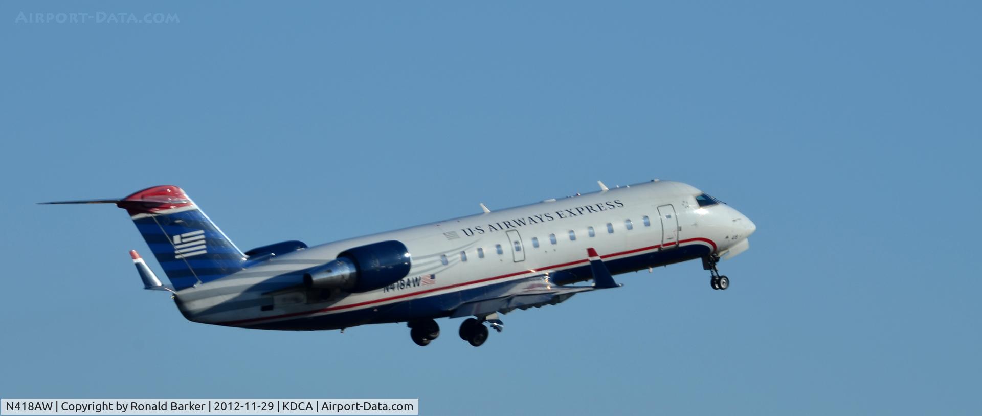 N418AW, 2002 Bombardier CRJ-200LR (CL-600-2B19) C/N 7618, Takeoff DCA