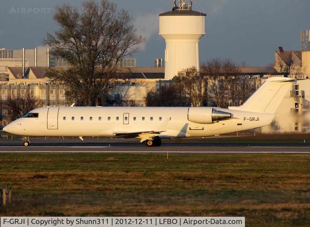 F-GRJI, 1996 Canadair CRJ-100ER (CL-600-2B19) C/N 7147, Ready for take off rwy 32R in all white c/s...