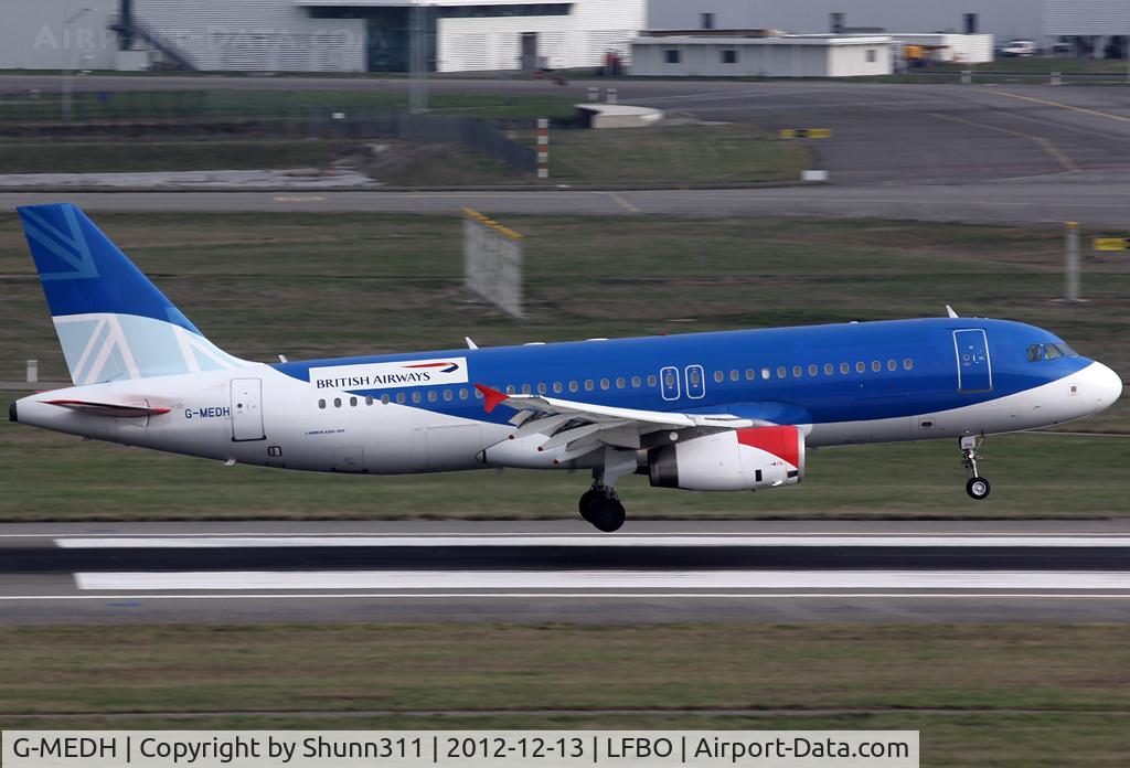 G-MEDH, 2003 Airbus A320-232 C/N 1922, Landing rwy 14R in BMI c/s with additional British Airways titles...