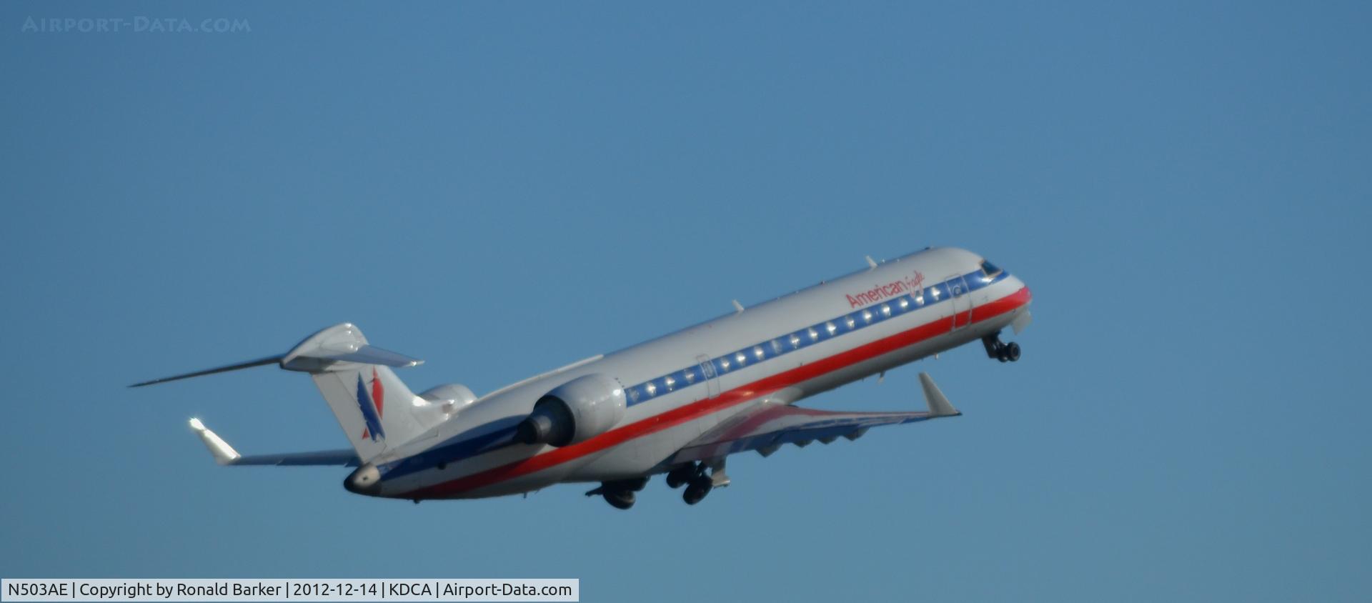 N503AE, 2002 Bombardier CRJ-701ER (CL-600-2C10) Regional Jet C/N 10021, Takeoff DCA