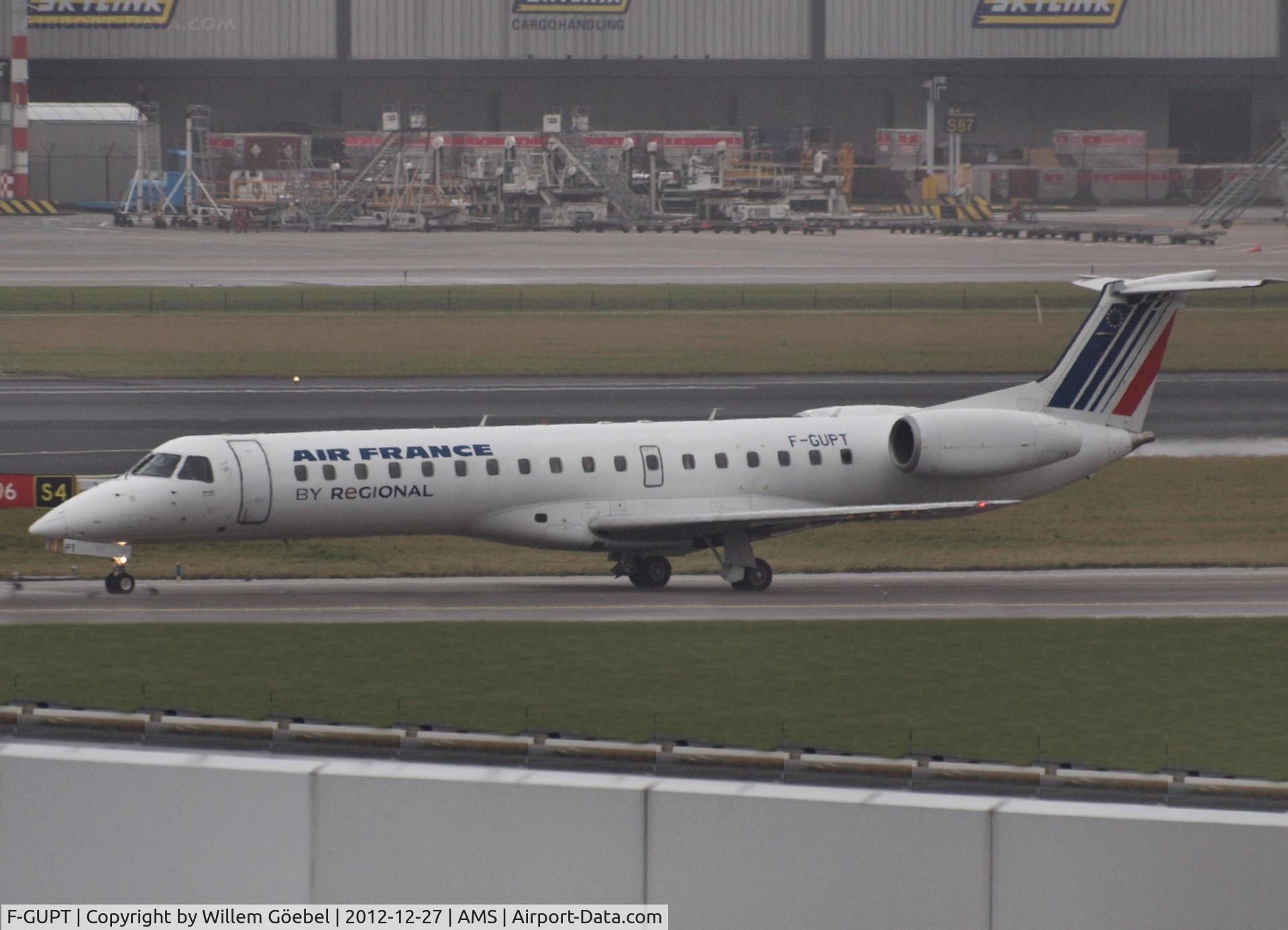 F-GUPT, 2000 Embraer ERJ-145LR (EMB-145LR) C/N 145294, Taxi to runway 24 of Amsterdam Airport for take off.