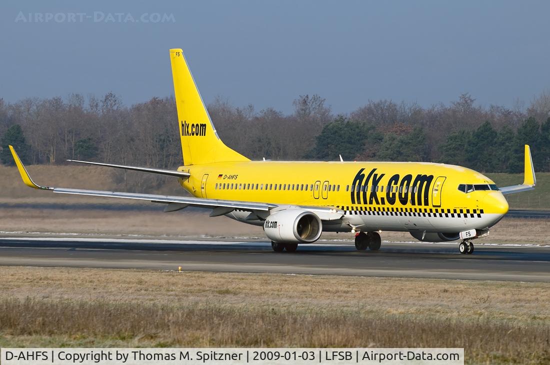 D-AHFS, 2000 Boeing 737-8K5 C/N 28623, TUIfly D-AHFS still wearing HLX c/s leaving BSL on a cold winter morning