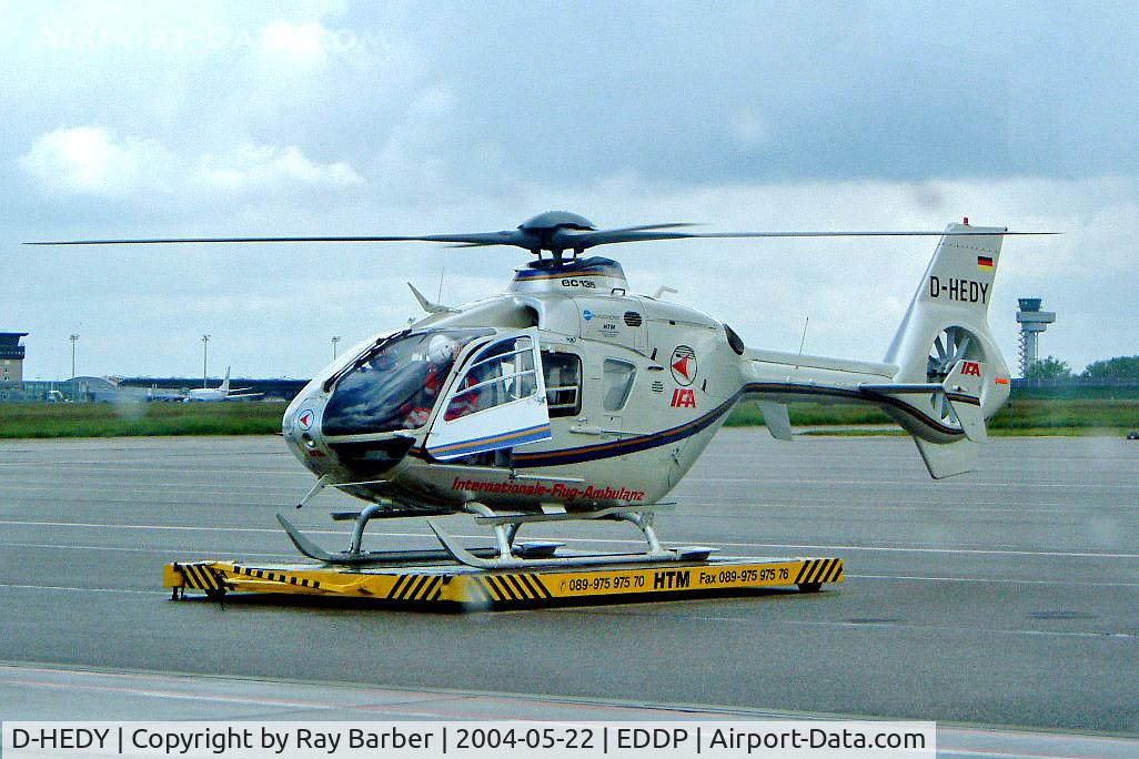 D-HEDY, 1998 Eurocopter EC-135T-1 C/N 0087, Eurocopter EC.135T1 [0087] (IFA Internationale Flug Ambulanz) Leipzig-Halle~D 22/05/2004. Taken through coach window in the rain.