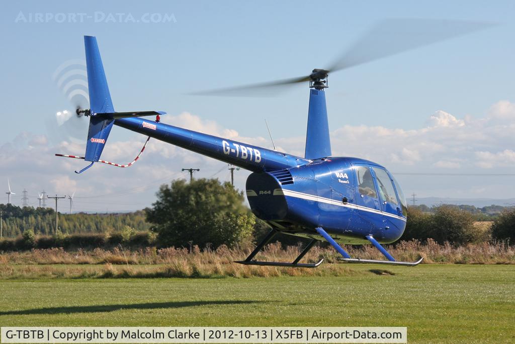 G-TBTB, 2006 Robinson R44 Raven C/N 1559, Robinson R44 Raven. Fishburn Airfield UK, October 2012.