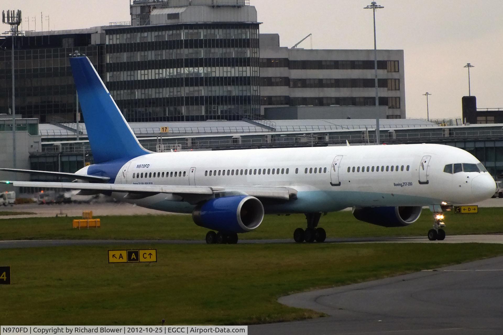 N970FD, 1997 Boeing 757-28A C/N 28166, Departing Manchester on a cloudy afternoon
