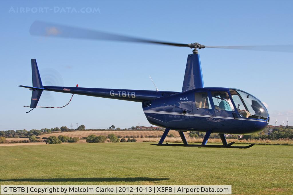 G-TBTB, 2006 Robinson R44 Raven C/N 1559, Robinson R44 Raven. Fishburn Airfield UK, October 2012.