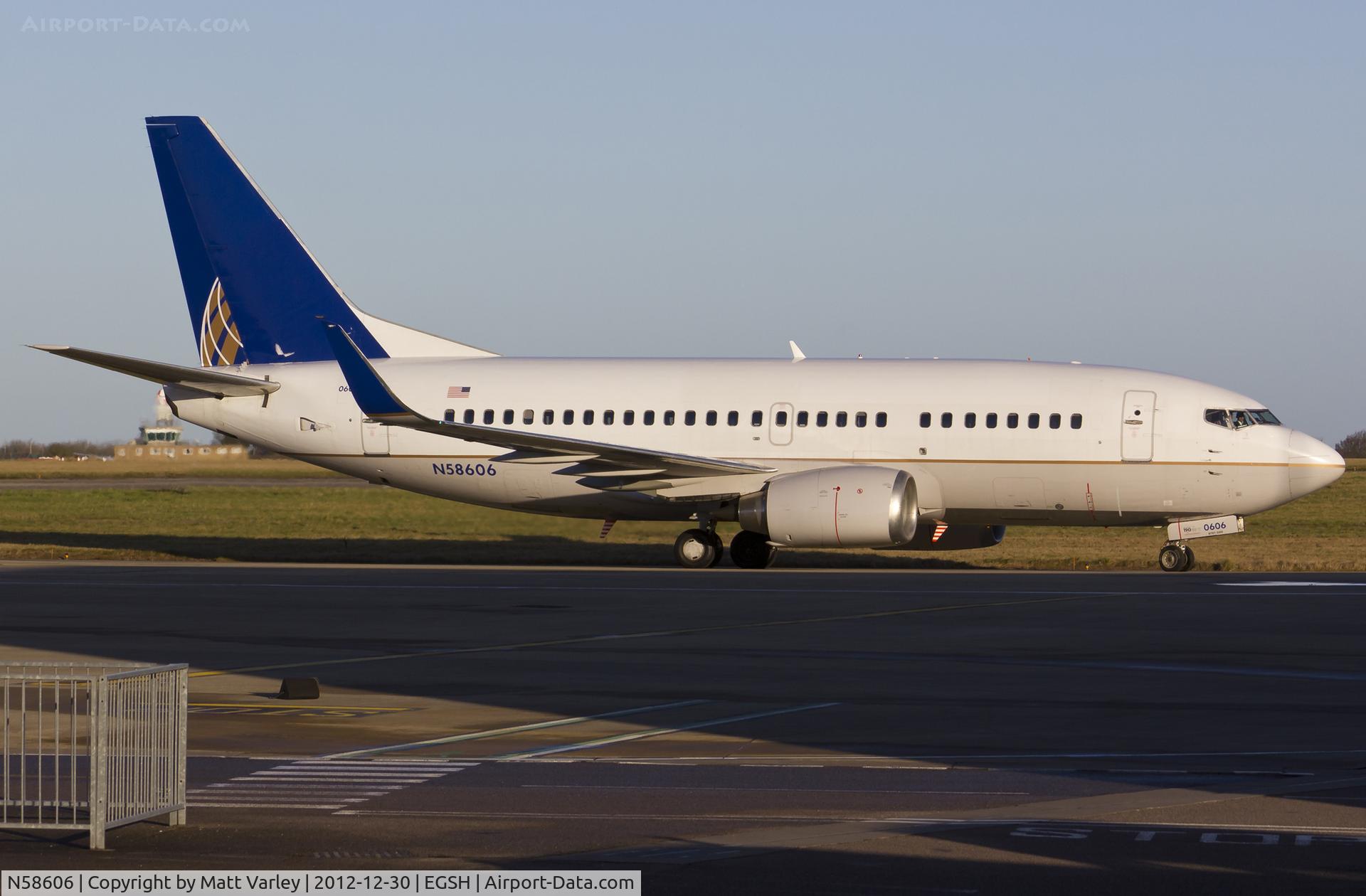 N58606, 1994 Boeing 737-524 C/N 27319, Taxiing to stand 6 after arriving for Mx by KLM UK.