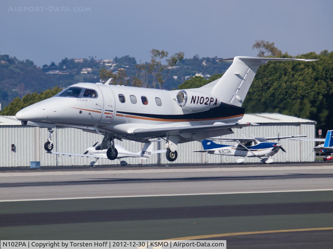 N102PA, 2009 Embraer EMB-500 Phenom 100 C/N 50000030, N102PA arriving on RWY 21