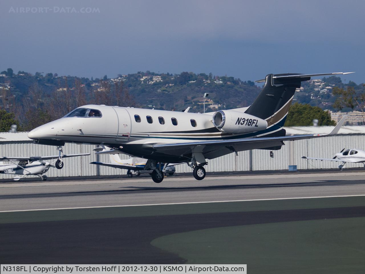 N318FL, 2011 Embraer EMB-505 Phenom 300 C/N 50500047, N318FL arriving on RWY 21