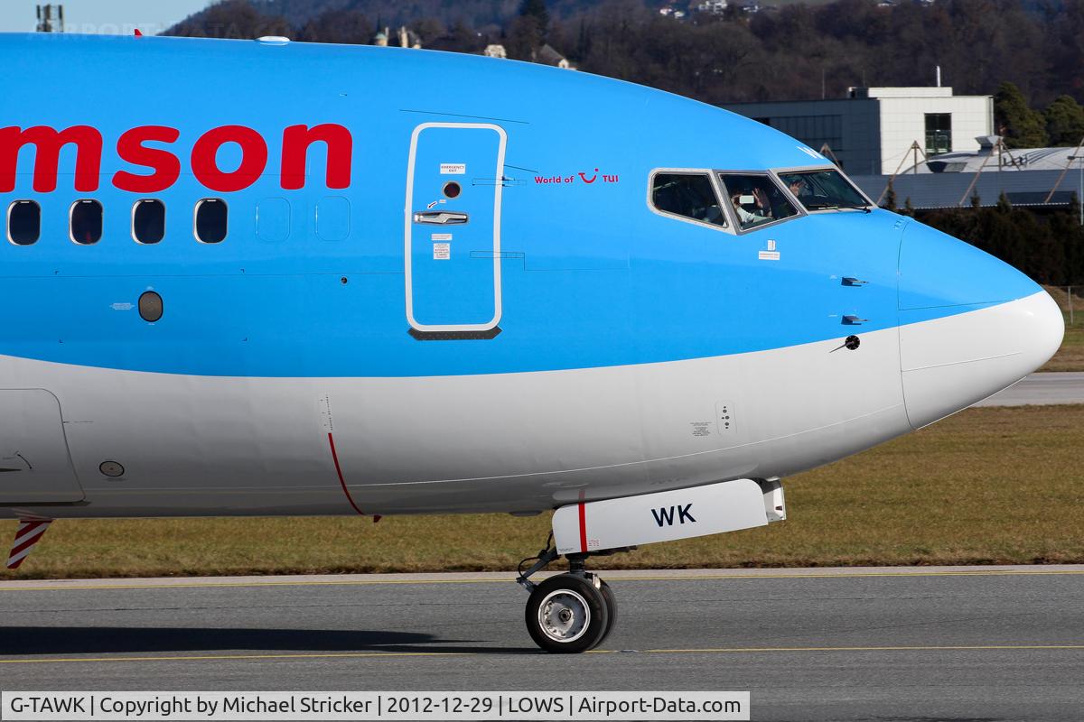 G-TAWK, 2012 Boeing 737-8K5 C/N 37239, Notice the pilot who takes a picture of us.