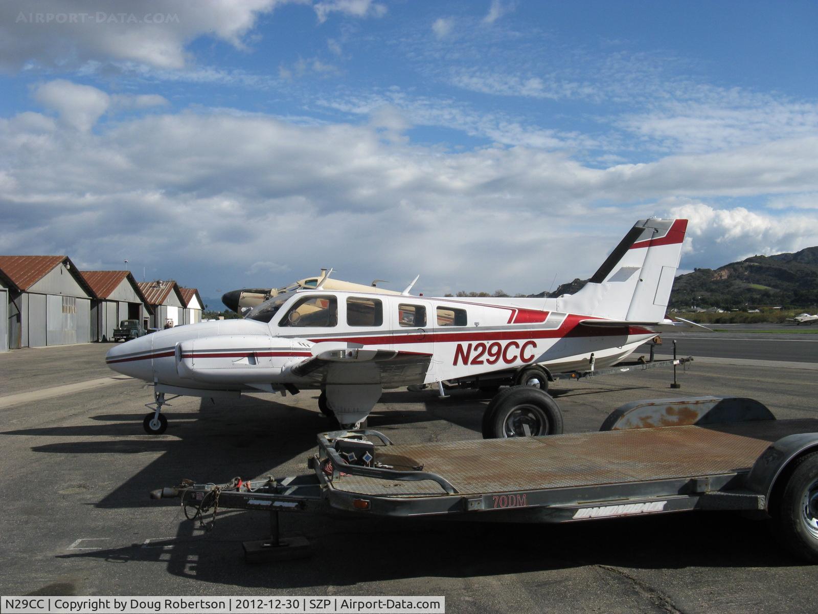 N29CC, 1977 Beech 58P Baron C/N TJ-117, 1977 Beech 58P BARON, two Turbosupercharged Continental TSIO-520-LB1C 310 Hp each, pressurized, pax door this side, pilot door over wing right side, 6 seats, props off for maintenance