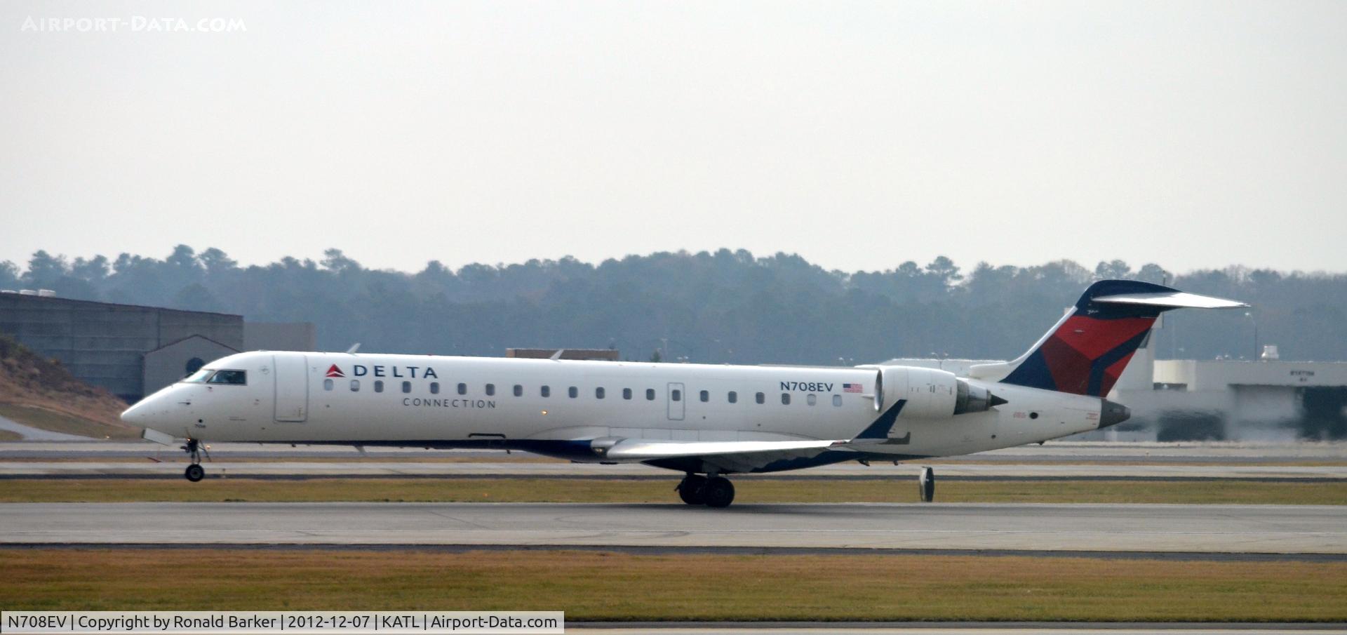 N708EV, 2002 Bombardier CRJ-701 (CL-600-2C10) Regional Jet C/N 10060, Takeoff (NWLO) Atlanta