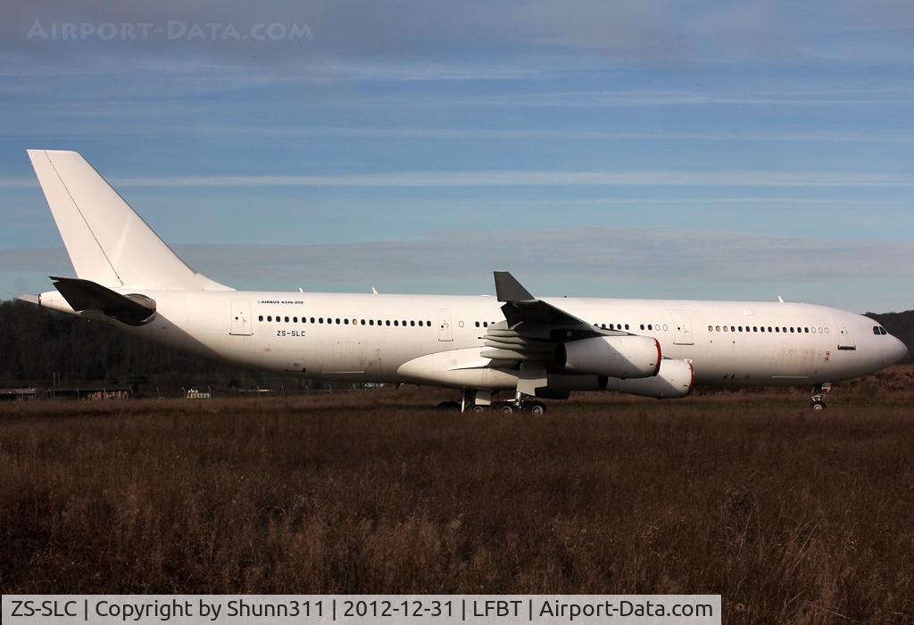 ZS-SLC, 1993 Airbus A340-211 C/N 018, Stored in all white c/s without titles... Ex. South African Airways