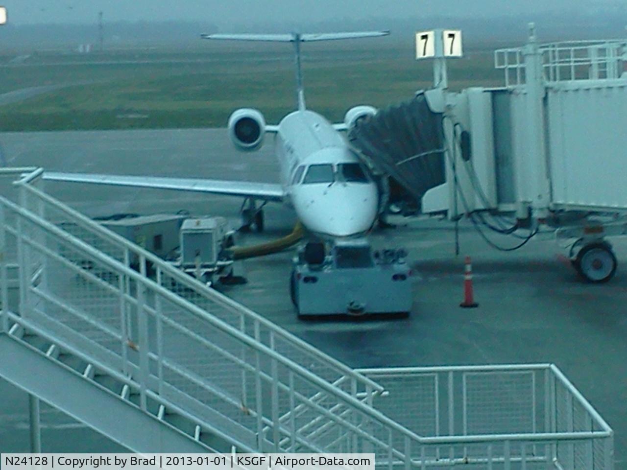 N24128, 2003 Embraer ERJ-145XR (EMB-145XR) C/N 145700, United 6106 (SGF to DEN) on New Year's day