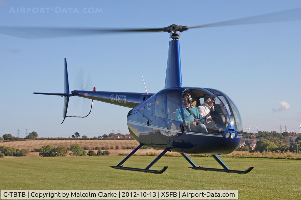 G-TBTB, 2006 Robinson R44 Raven C/N 1559, Robinson R44 Raven, Fishburn Airfield UK, October 2012.