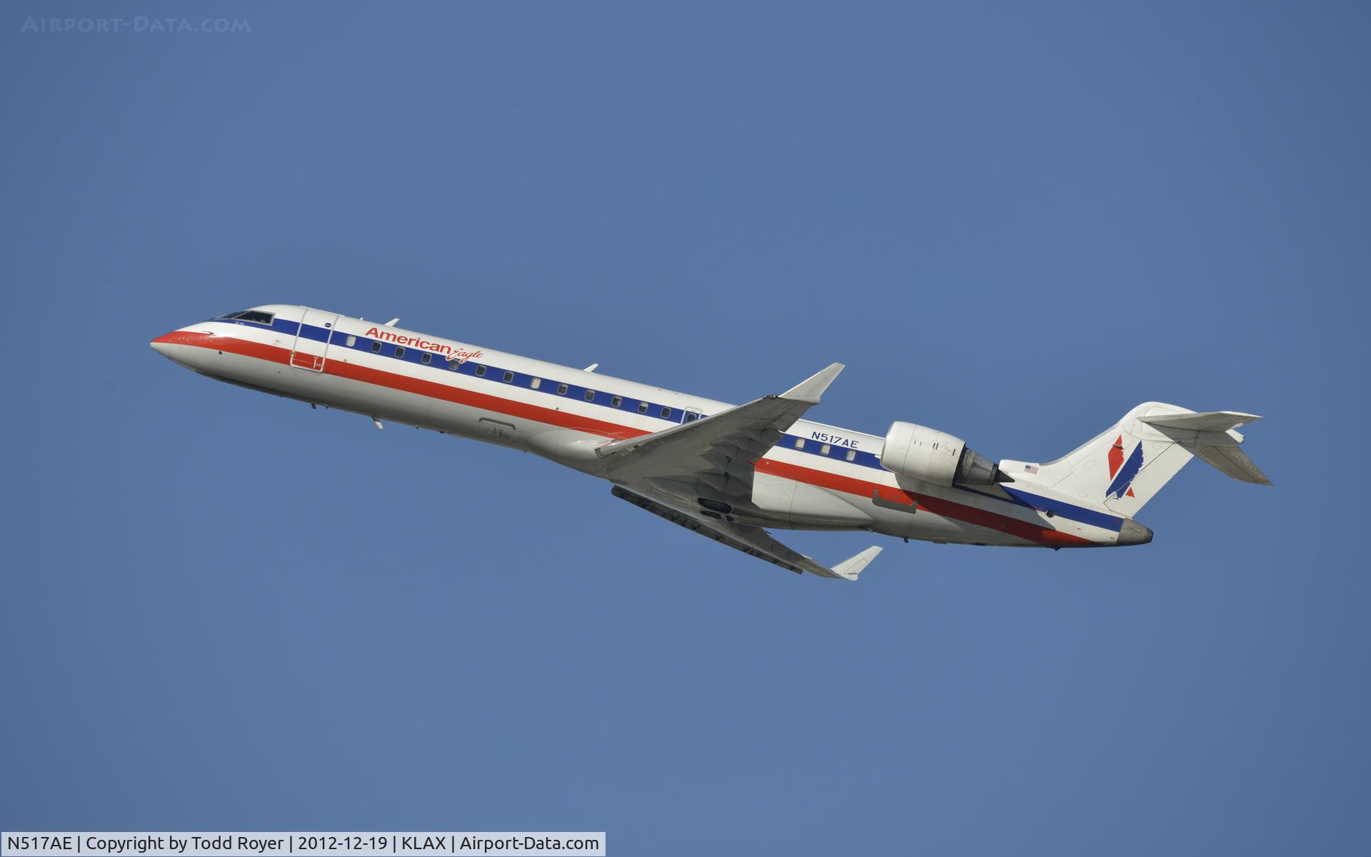 N517AE, 2003 Bombardier CRJ-701ER (CL-600-2C10) Regional Jet C/N 10124, Departing LAX