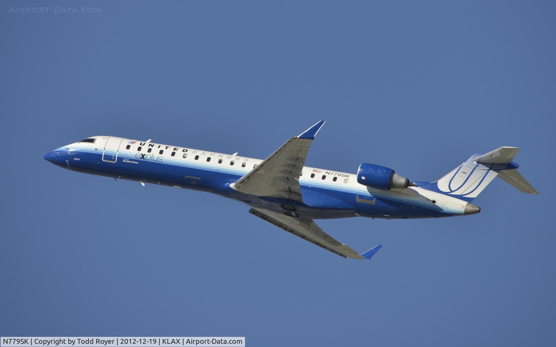 N779SK, 2009 Bombardier CRJ-702 (CL-600-2C10) Regional Jet C/N 10276, Departing LAX