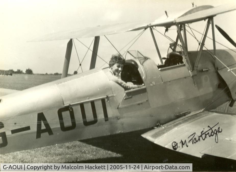 G-AOUI, De Havilland DH-82A Tiger Moth II C/N 85374, A photo my father took back in the 50's.  This was the plane he did his first solo in.  The lady was his girlfriend at the time.  He was 17.