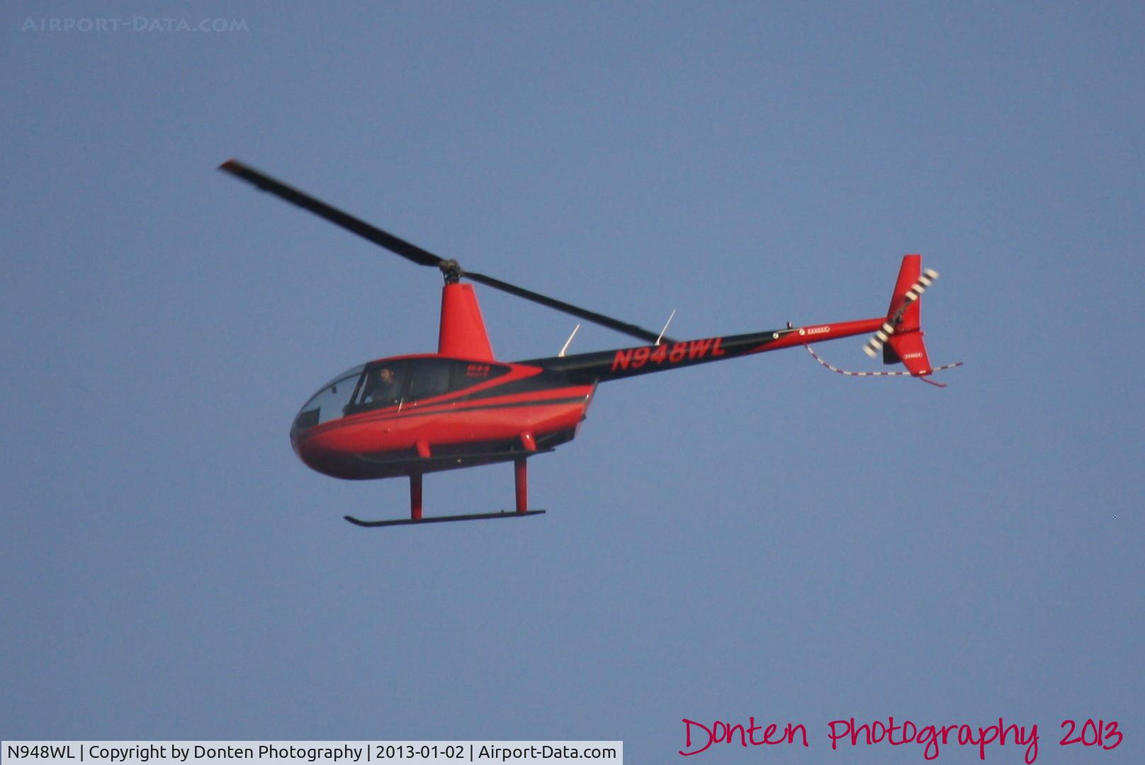 N948WL, 2007 Robinson R44 II C/N 11959, Robinson R44 (N948WL) flies over Overbrook Gardens